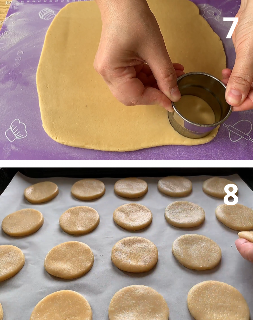 Round cookies cut from rolled dough and arranged on a parchment-lined baking sheet.